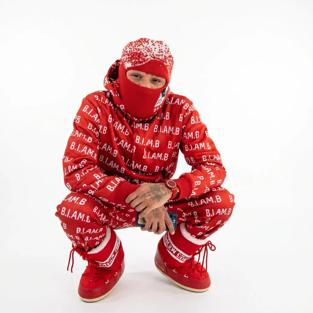 Model wearing red B.I.AM.B logo-pattern winter set crouching