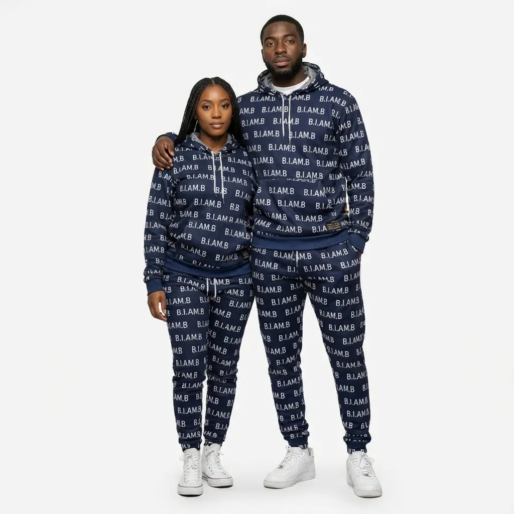 Models wearing matching navy B.I.AM.B all-over print hoodie and jogger set 