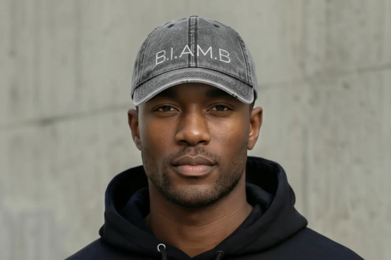 B.I.AM.B washed gray cap lifestyle image worn with black hoodie streetwear