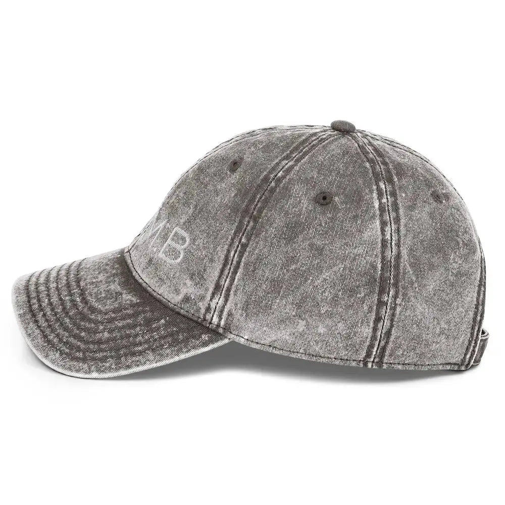 Left side view of B.I.AM.B Wear Your Power edition dad hat in stone grey with vintage washed finish and curved brim