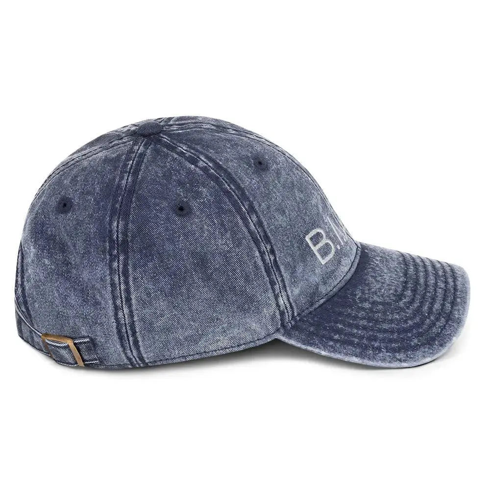 Right side view of B.I.AM.B Wear Your Power edition dad hat in vintage denim with embroidered logo